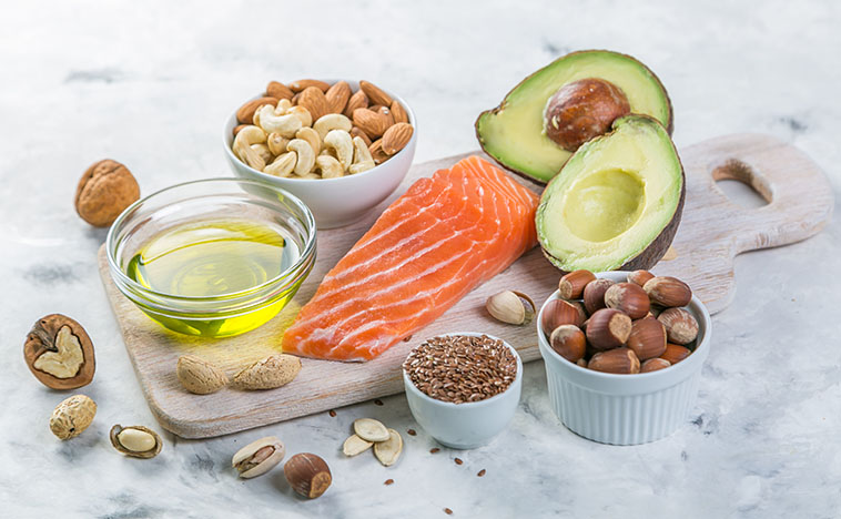 Selection of good fat sources - healthy eating concept. Ketogenic diet concept, copy space